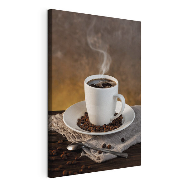 Canvas Schilderijen Kopje koffie op een bord met koffiebonen