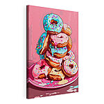 Canvas Schilderijen Stapel donuts met glazuur en hagelslag