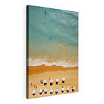 Canvas Schilderijen Groep mensen op een strand met parasols