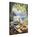 Canvas Schilderijen Tafel met eten en drinken bij een meer