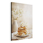 Canvas Schilderijen Stapel pannenkoeken met bloemen erop