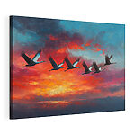 Canvas Schilderijen Een groep vogels die door de lucht vliegen