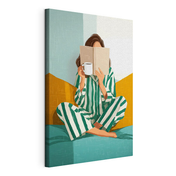 Vrouw die op een bed zit met een boek en een mok Canvas Schilderijen Vrouw die op een bed zit met een boek en een mok