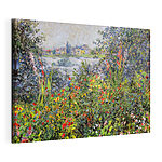 Canvas Schilderijen Kleurrijke bloemen onder een heldere hemel