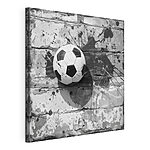 Canvas Schilderijen Voetbal op een geschilderde achtergrond
