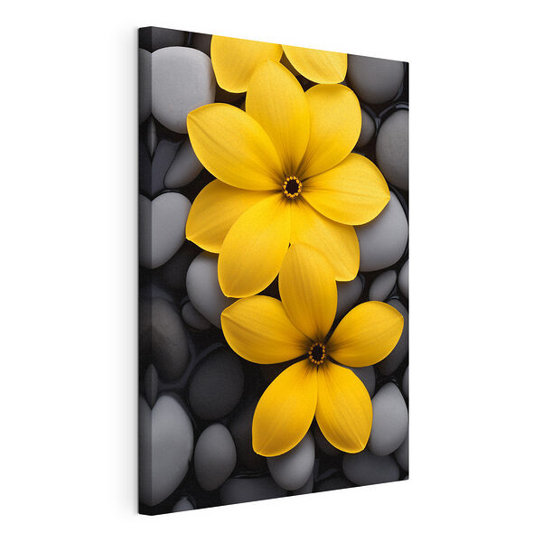 Canvas Schilderijen Gele bloemen op een stapel rotsen