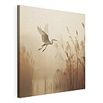 Canvas Schilderijen Vogel die over het water vliegt