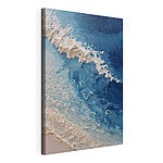 Canvas Schilderijen Zachte golven kussen het zandstrand