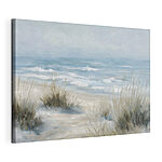 Canvas Schilderijen Strand met gras en golven
