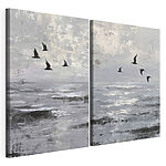 Modulaire canvasprint Een groep vogels die over het water vliegt