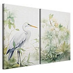 Modulaire canvasprint Witte vogel met een lange snavel, staande voor een plant